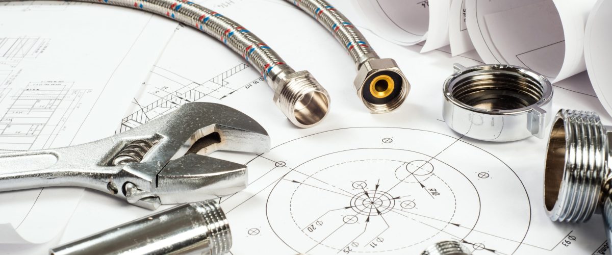 plumbing and drawings, construction still life plumbing and drawings are on the desktop, workspace engineer